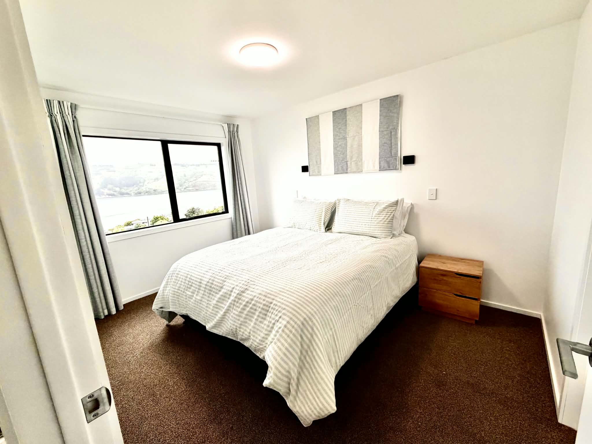 Second king bedroom overlooking Otago Harbour